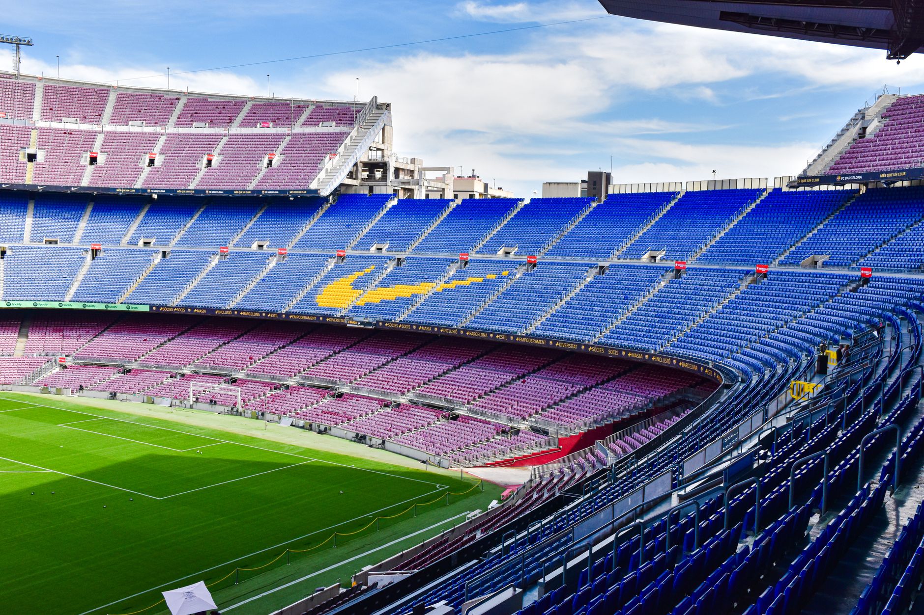 A wide-angle view of the iconic empty stands at Camp Nou, Barcelona's