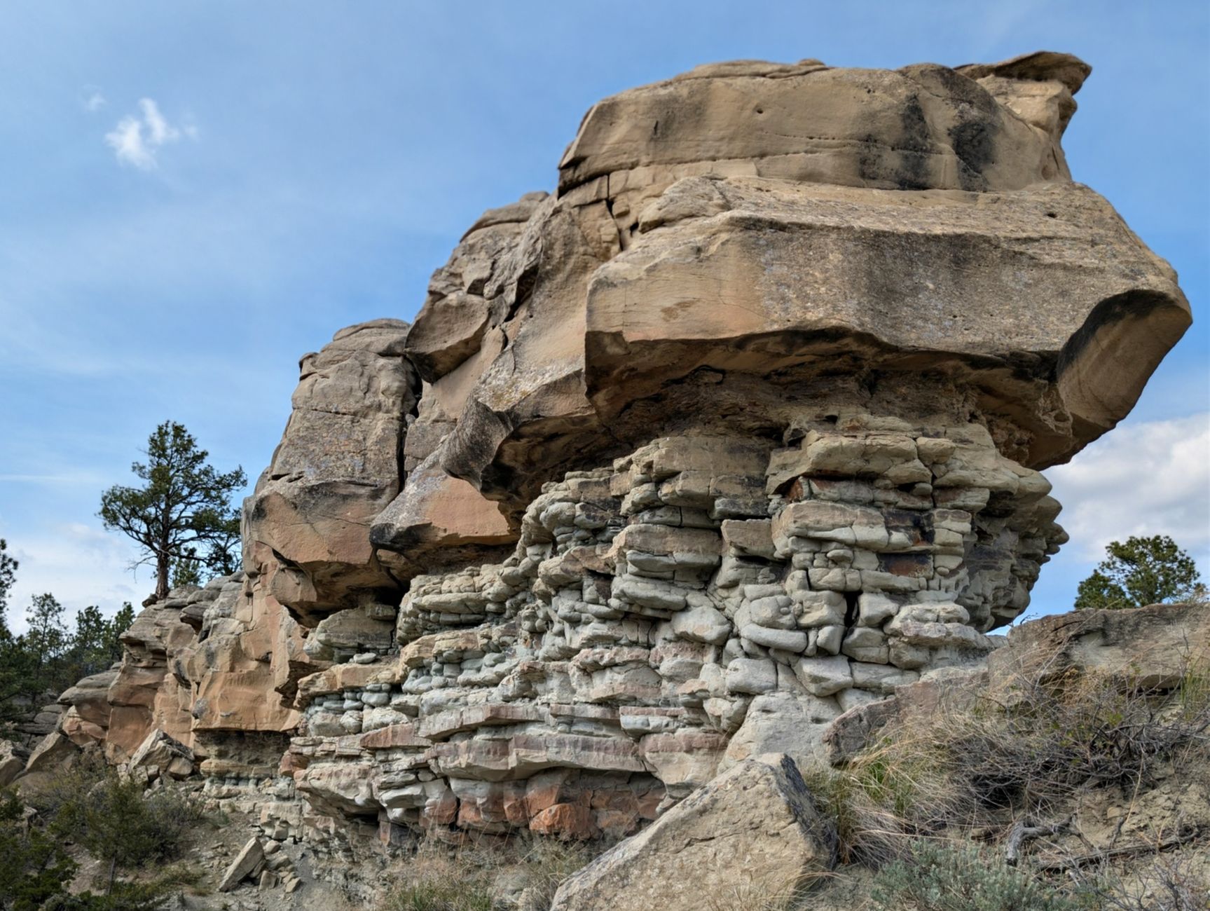 Dramatic rocky cliffs and stacked sedimentary layers in Broadview, Montana.