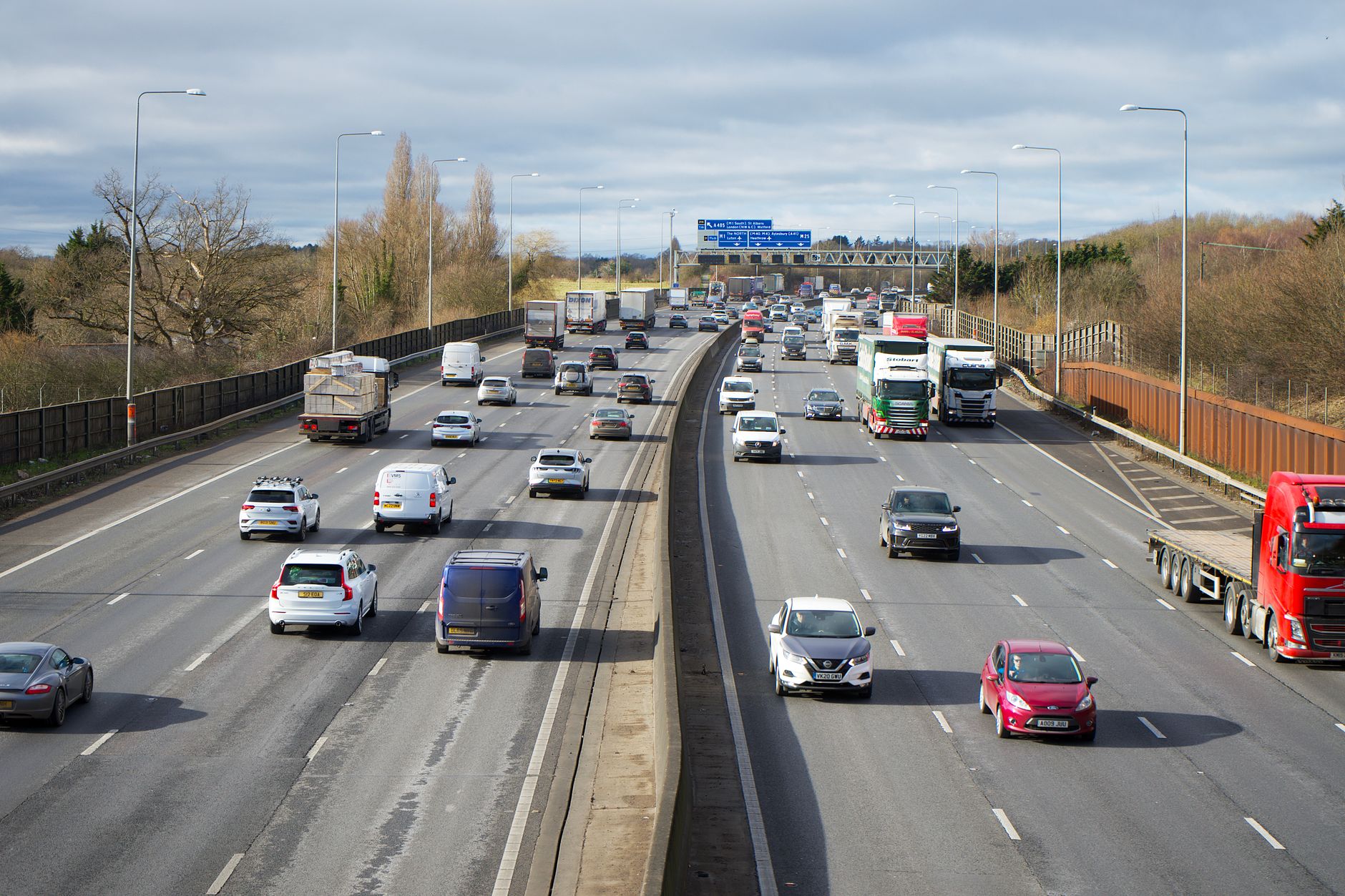 View of cars and trucks on a busy highway in St Albans,