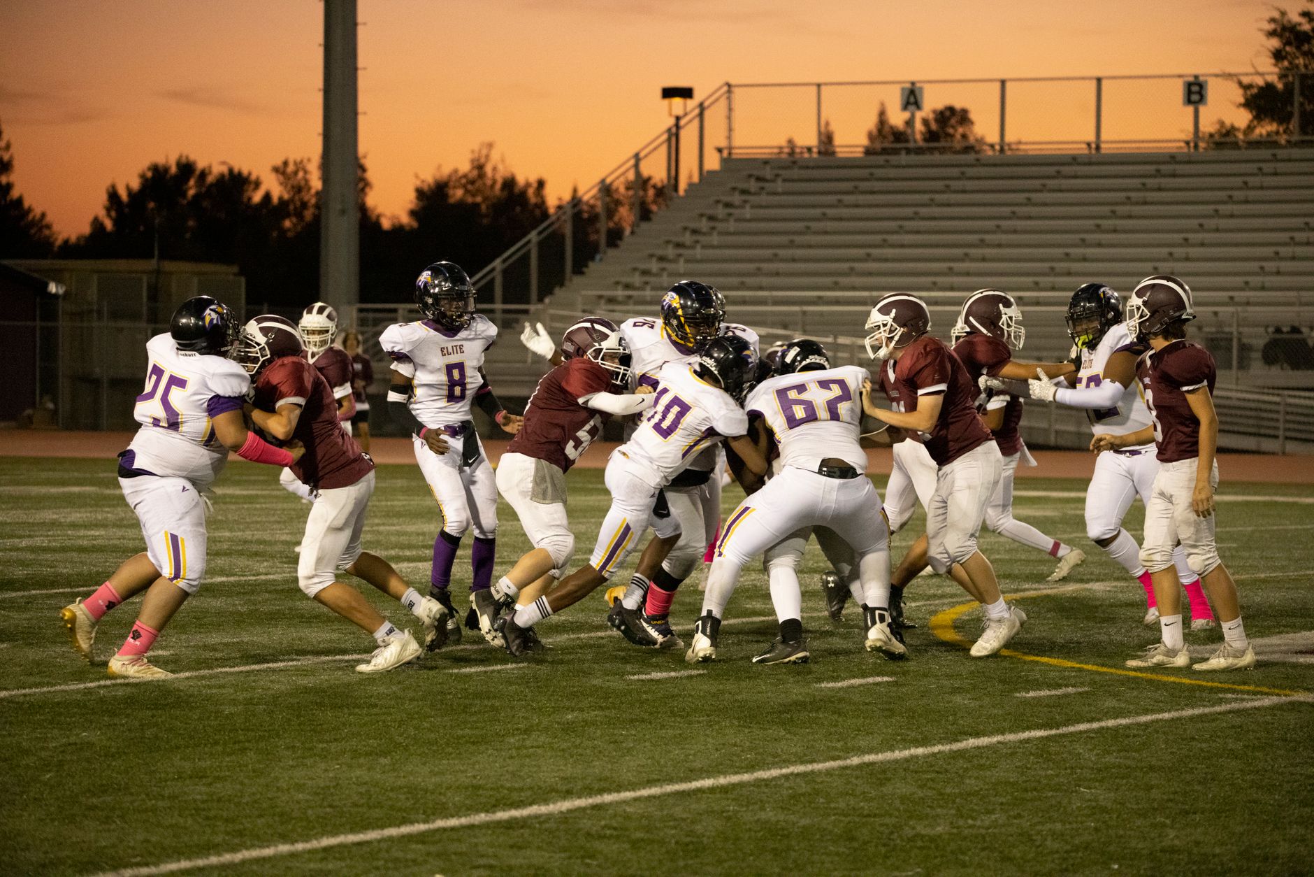Exciting high school football game with players in action on a field