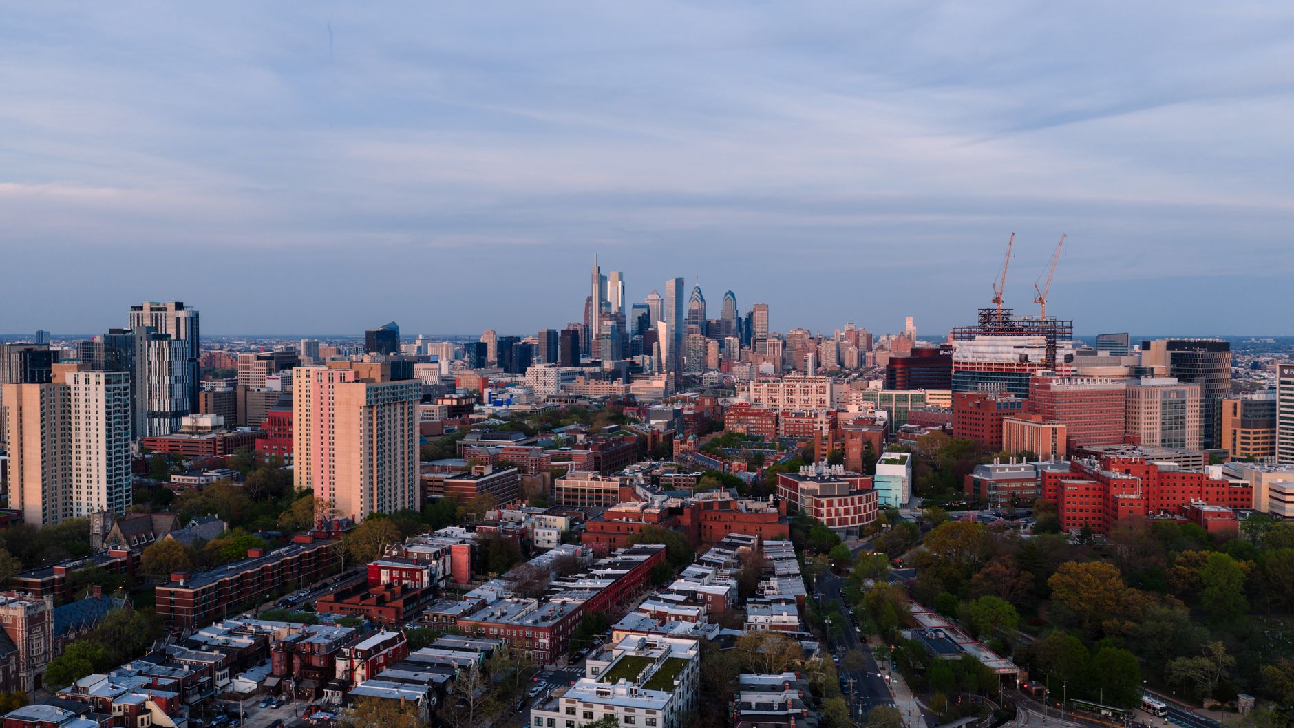 A stunning aerial view showcasing Philadelphia's skyline and urban landscape at dusk.