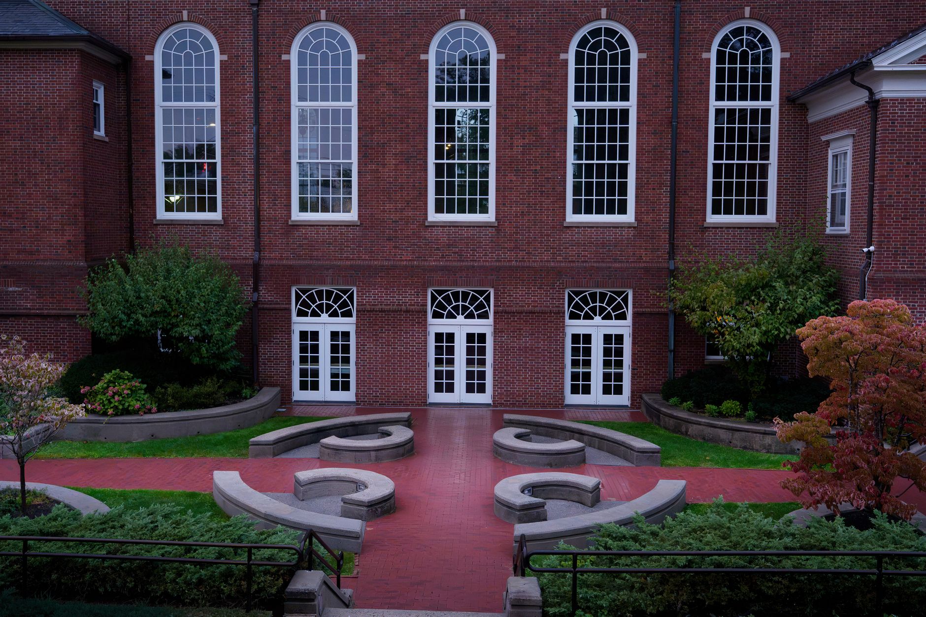 Elegant brick church courtyard at dawn in Darien, Connecticut, showcasing timeless architecture.
