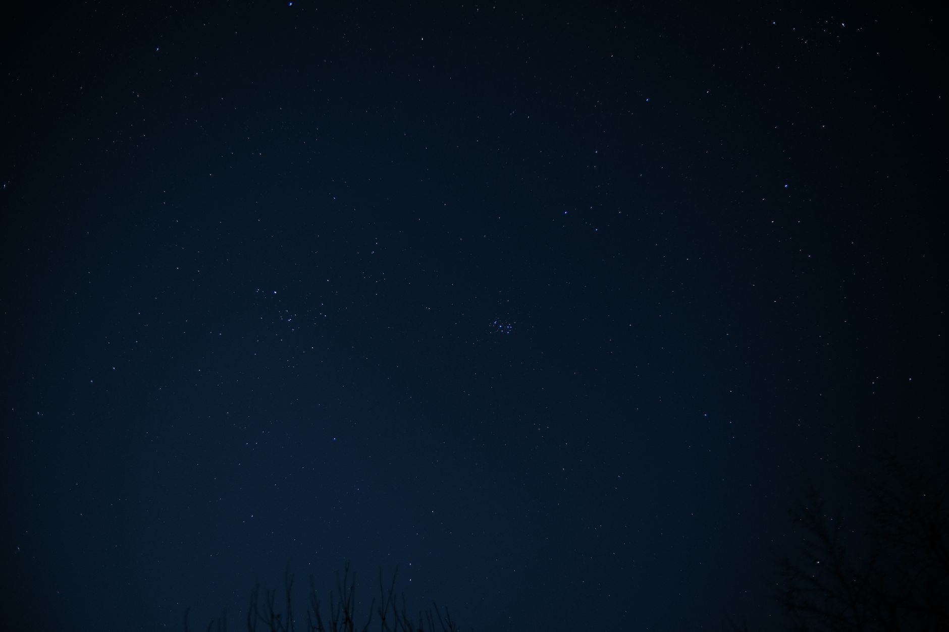 A serene view of a night sky filled with stars and constellations.