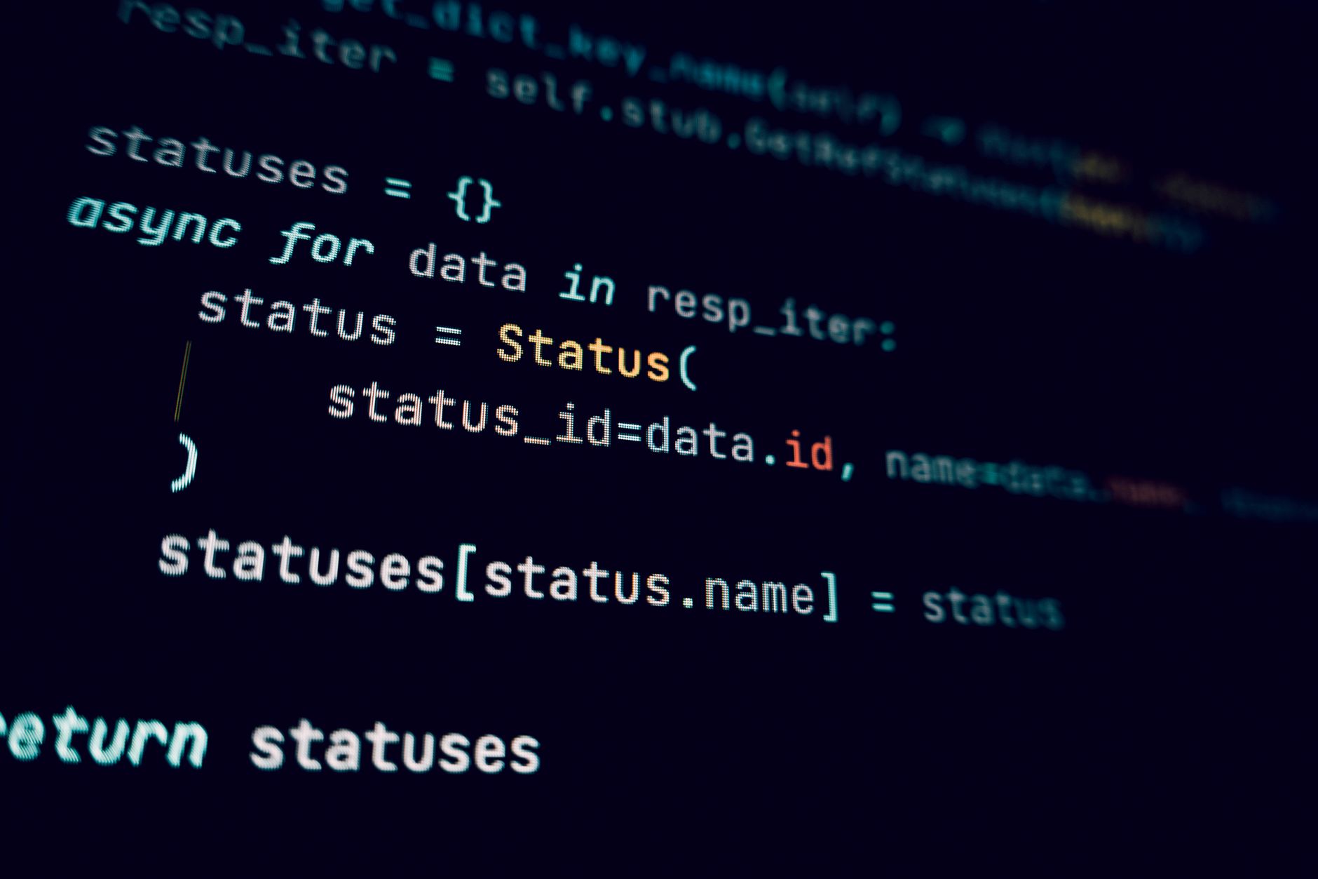 Detailed view of programming code in a dark theme on a computer