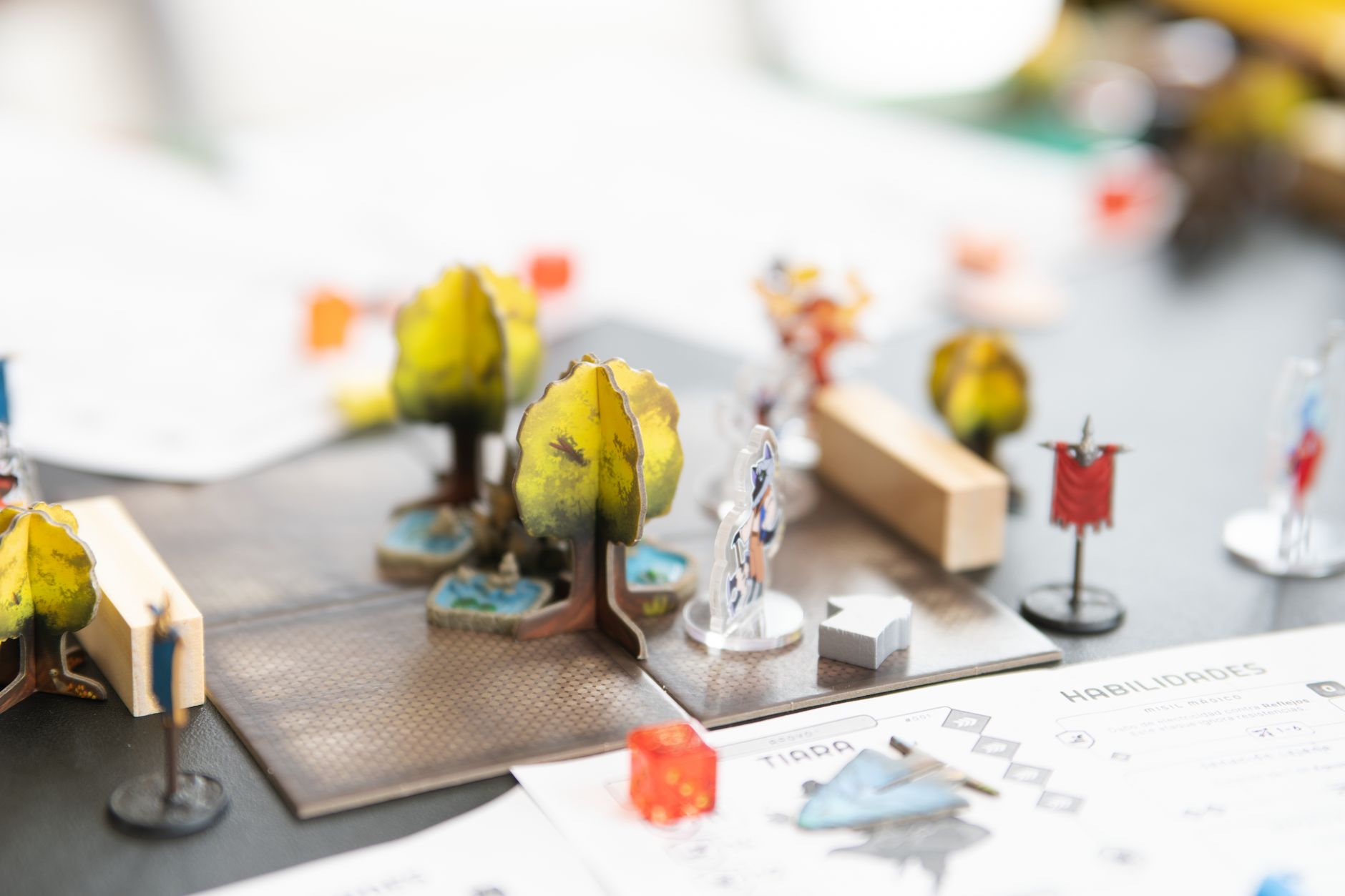 Detailed setup of a tabletop role-playing game with miniature figures and dice