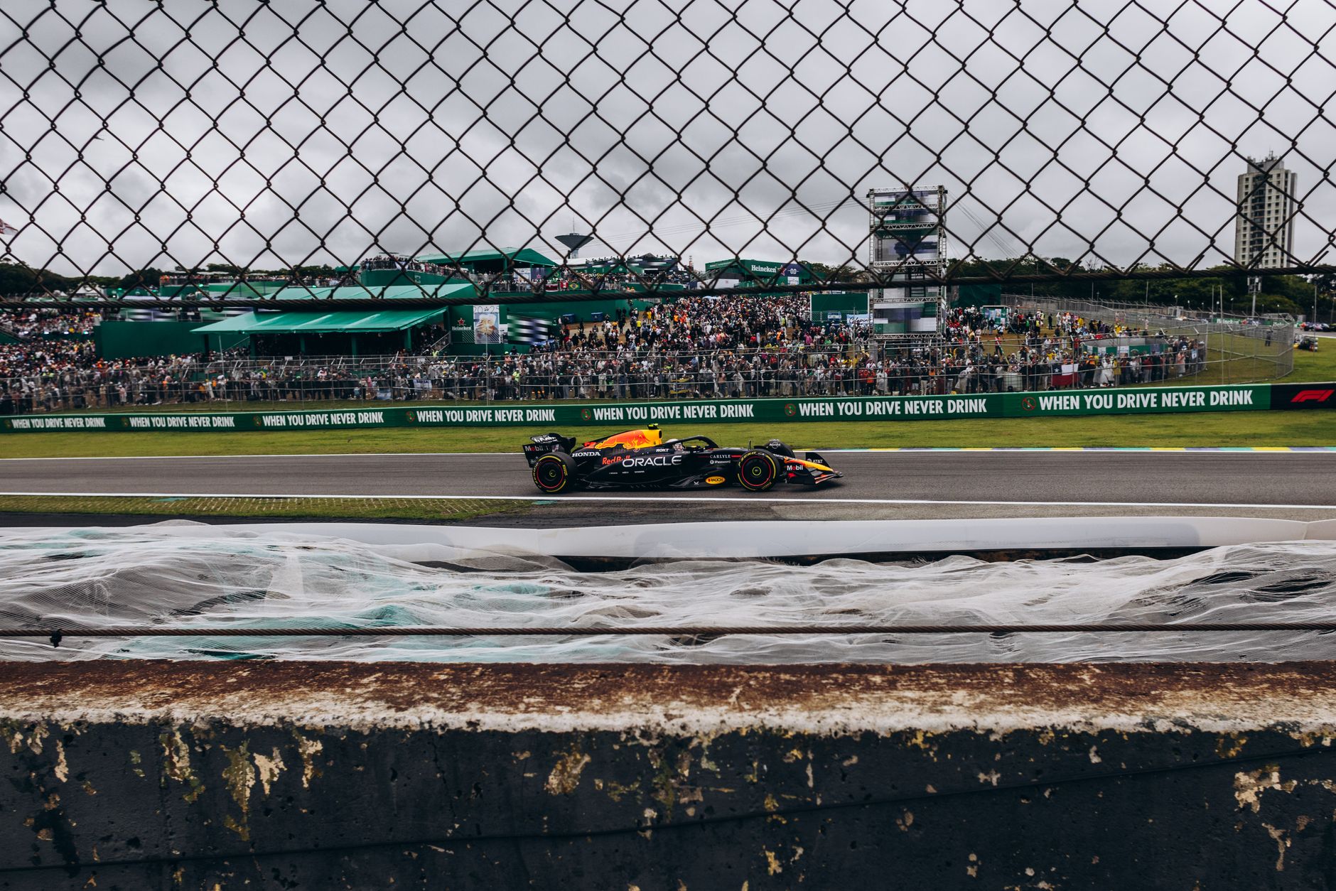 Exciting Formula 1 race captured at Interlagos Circuit, showcasing speed and vibrant