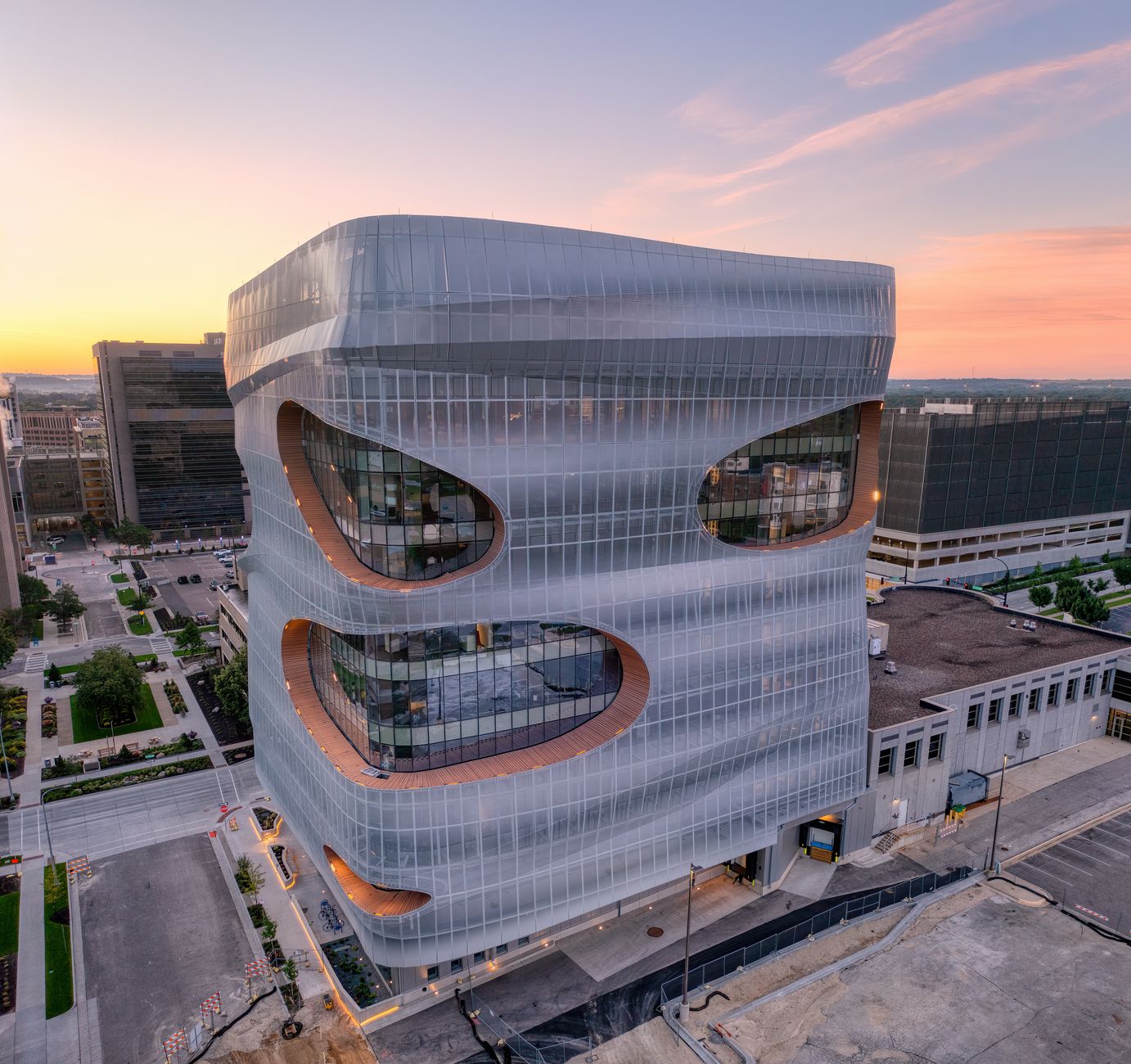 Aerial view of a modern, futuristic building in downtown Rochester, MN at