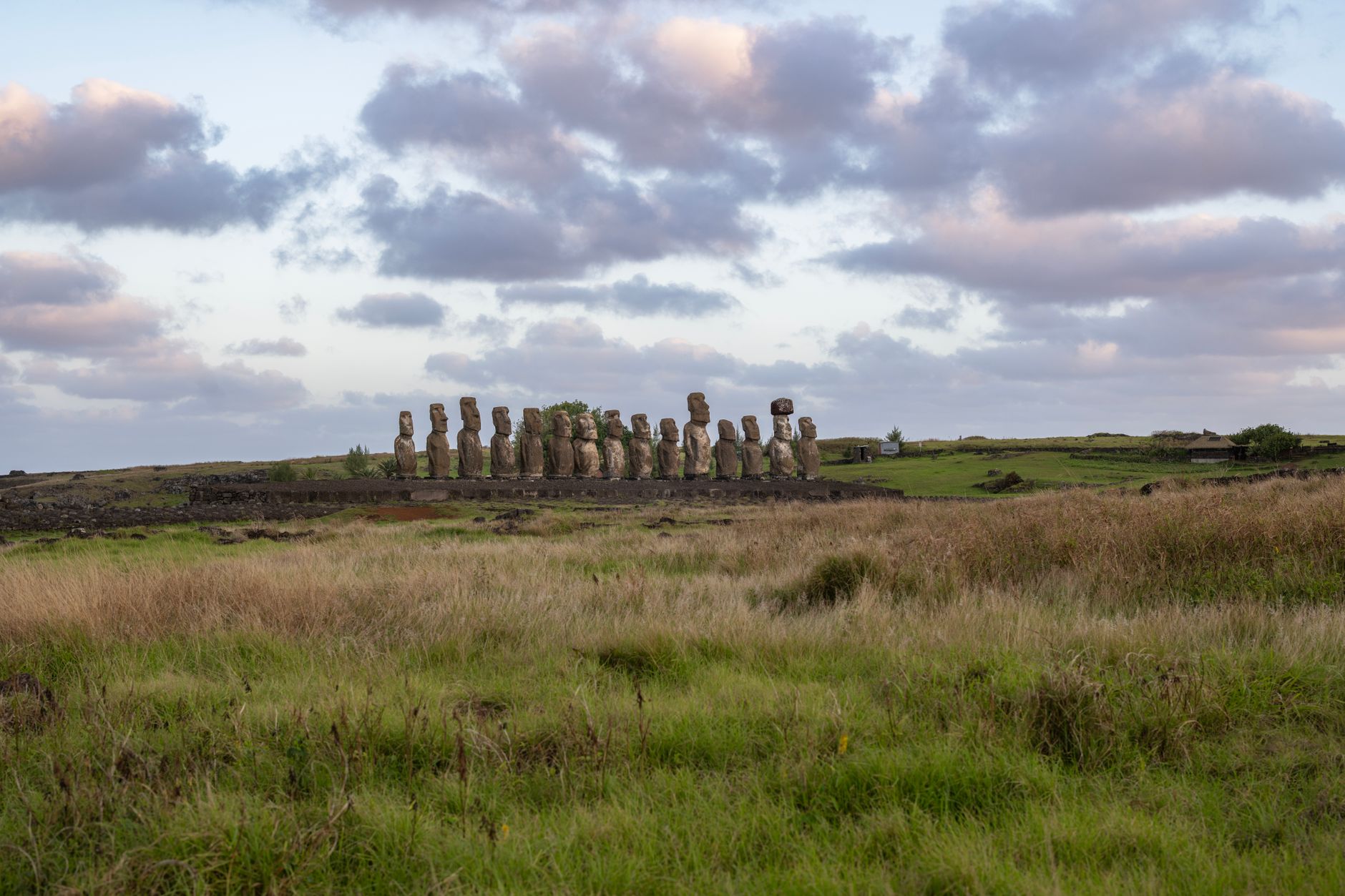 Majestic view of the Moai statues at Ahu Tongariki during sunset on