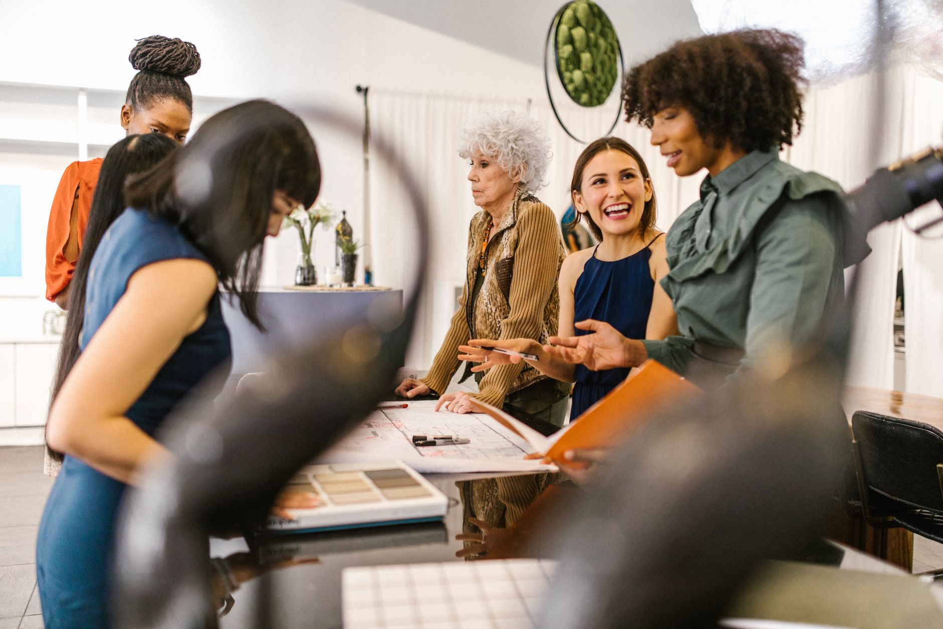 A group of diverse businesswomen having an interactive meeting in a modern
