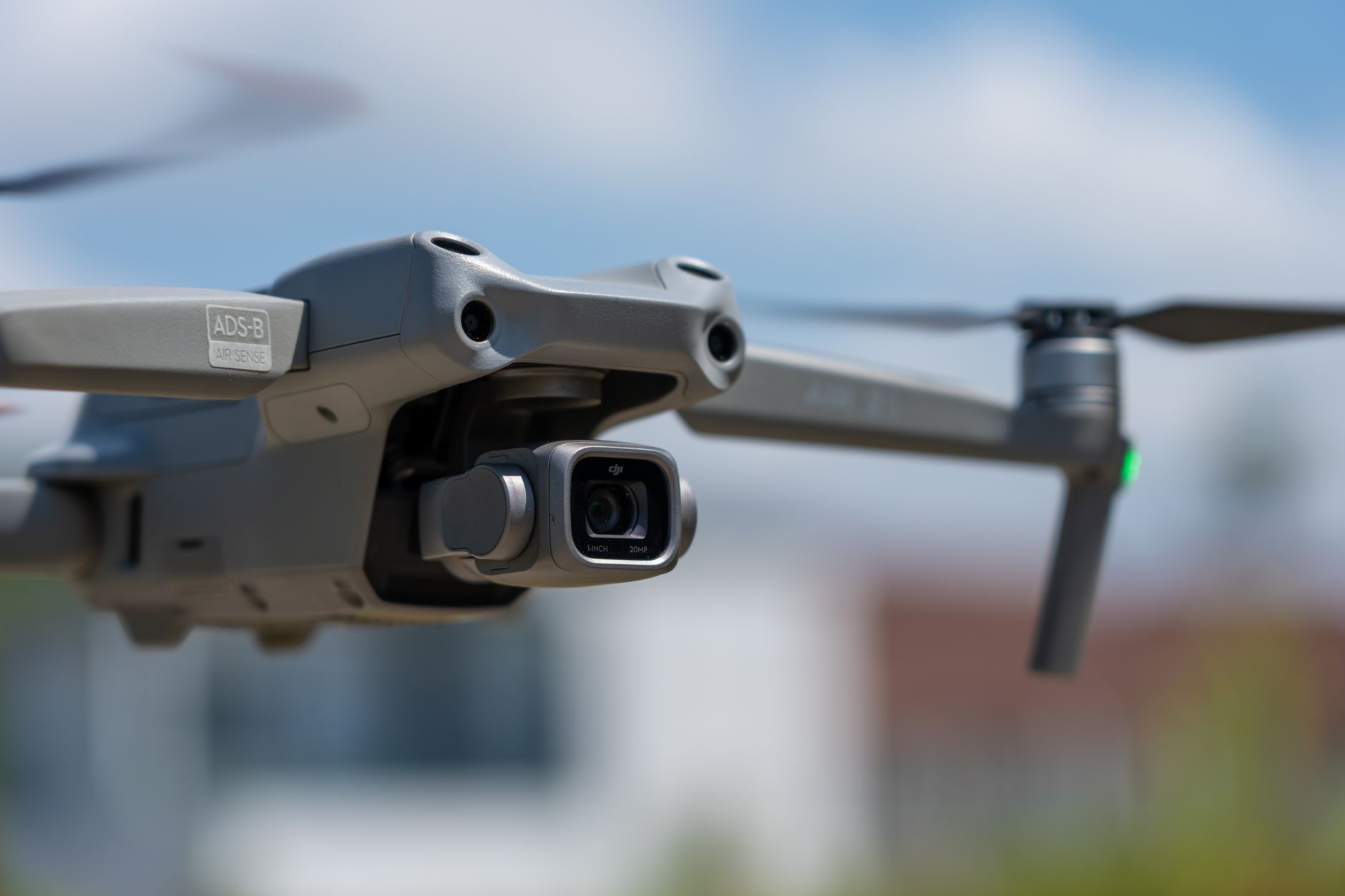 Detailed close-up of a drone in flight with camera set against a