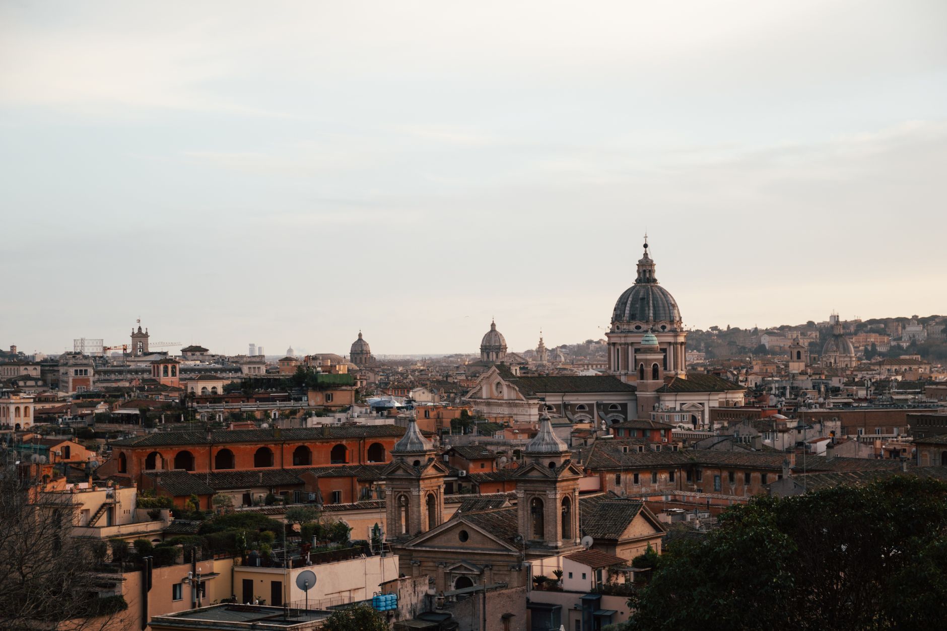 Captivating view of Rome's skyline featuring historic architecture and domes, captured at