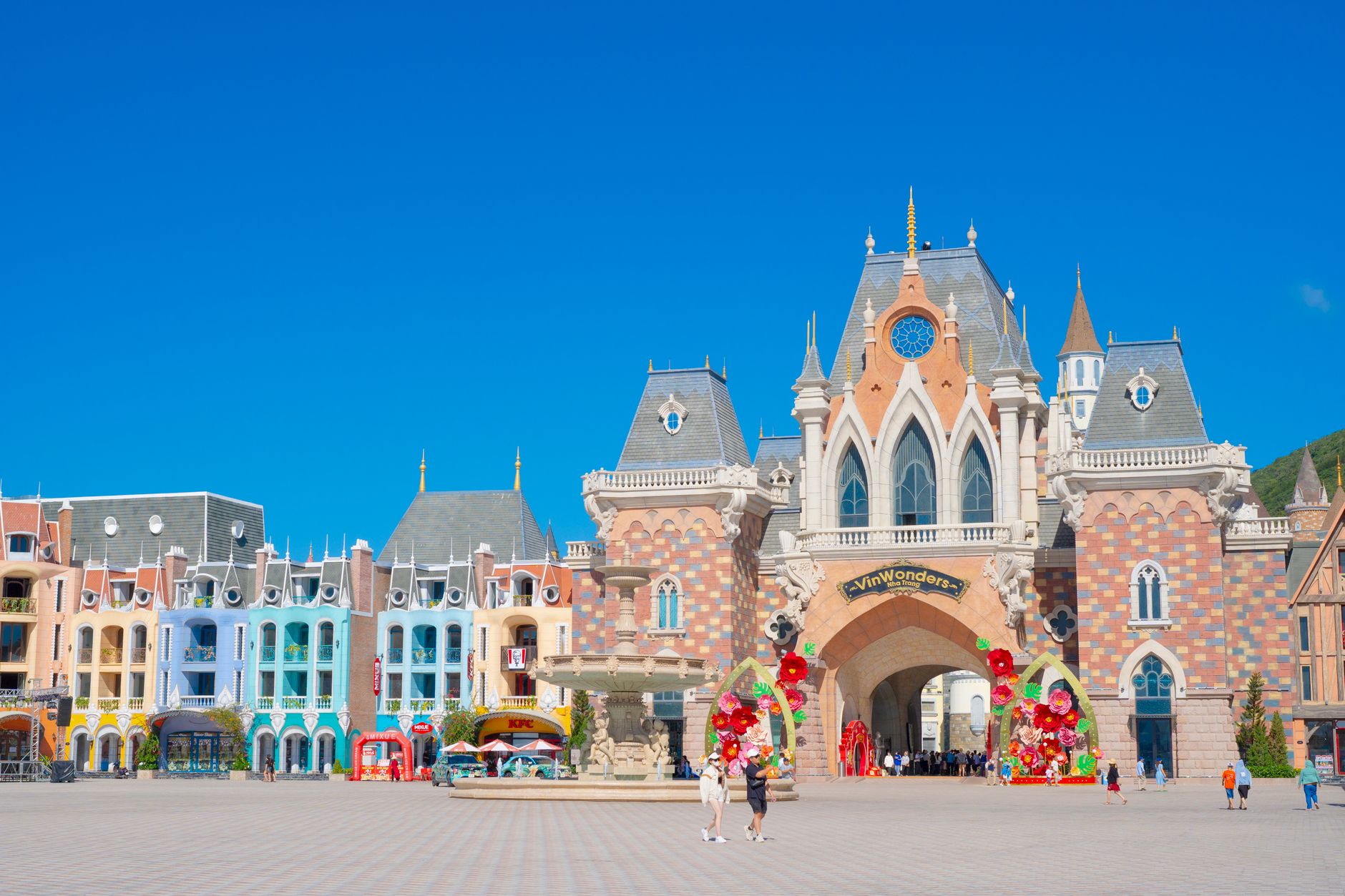 Colorful and vibrant entrance of VinWonders theme park on a clear day.