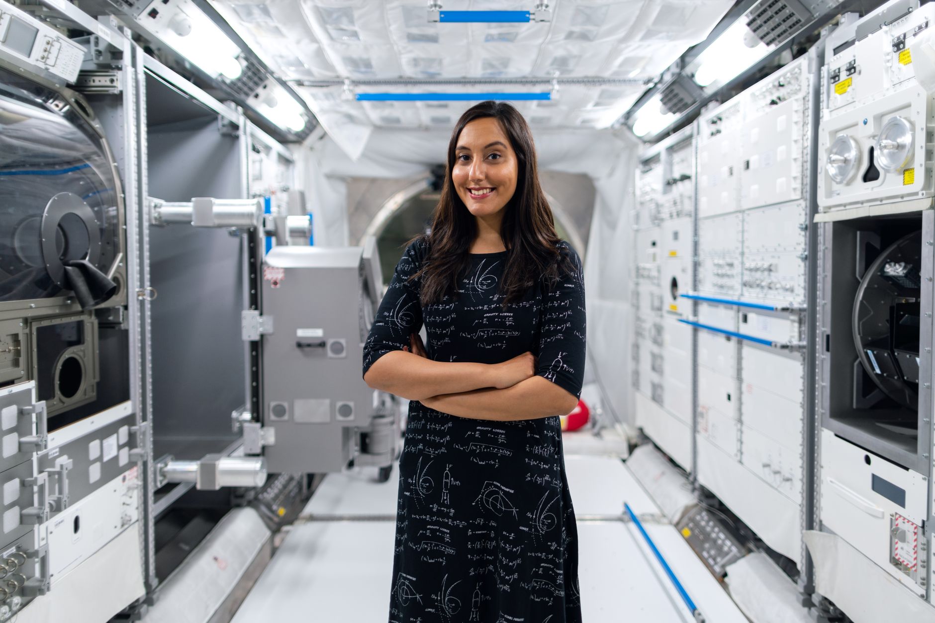A smiling female scientist in a futuristic space station, symbolizing innovation and