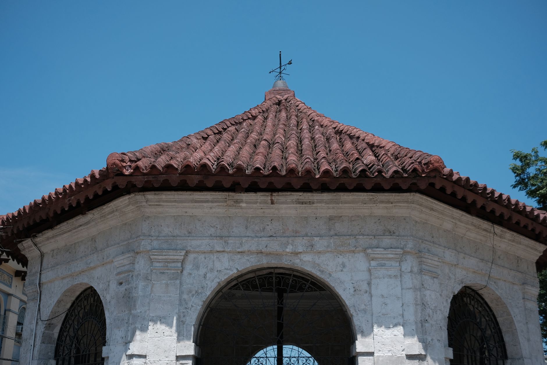 A historical view of Magellan's Cross Pavilion in Cebu City, Philippines, with