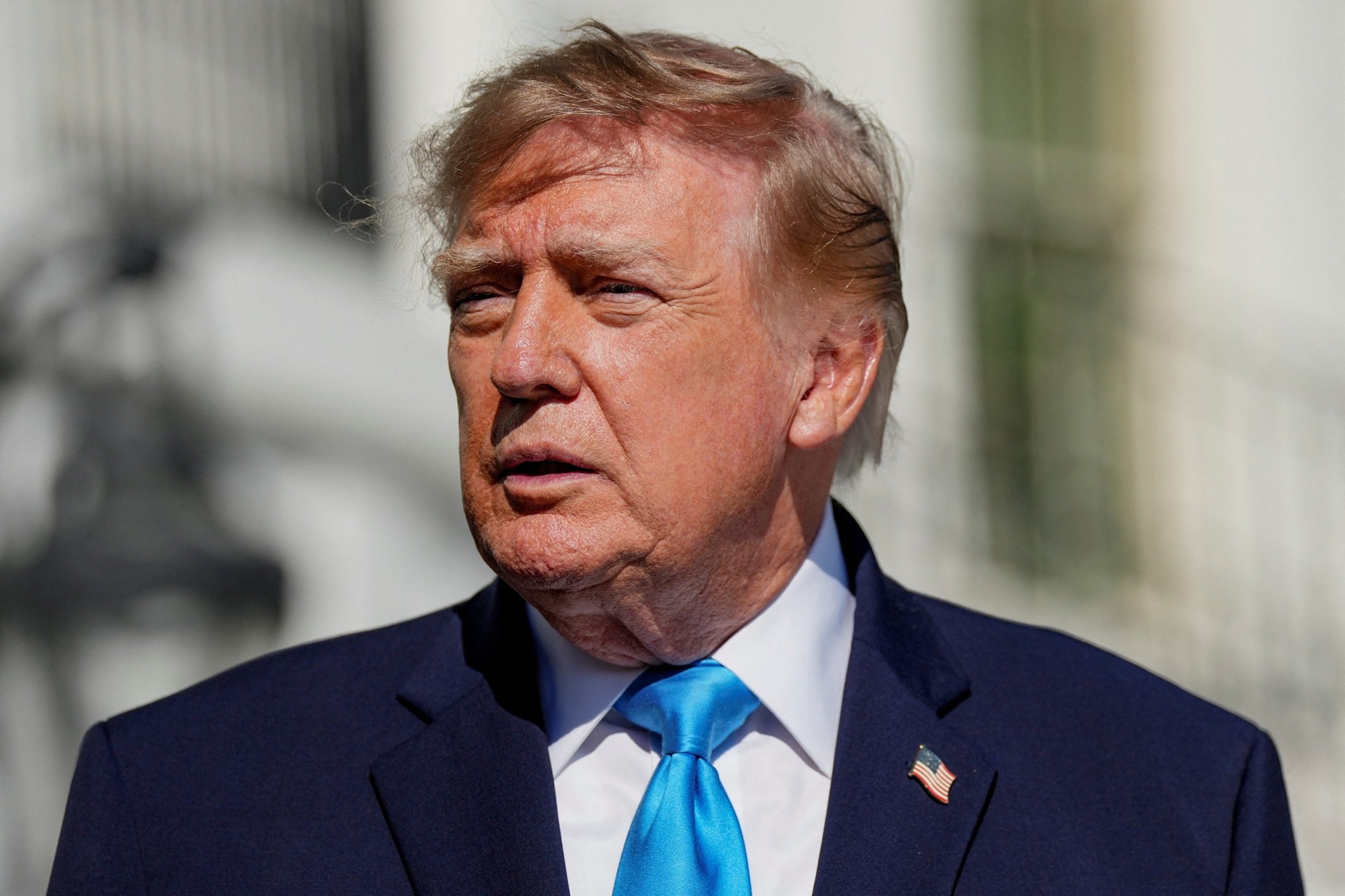 President Donald Trump speaks with media before boarding Marine One as he travels to Grand Island, Nebraska, on the South Lawn of the White House, Oct. 5, 2026.Eric Lee/Reuters