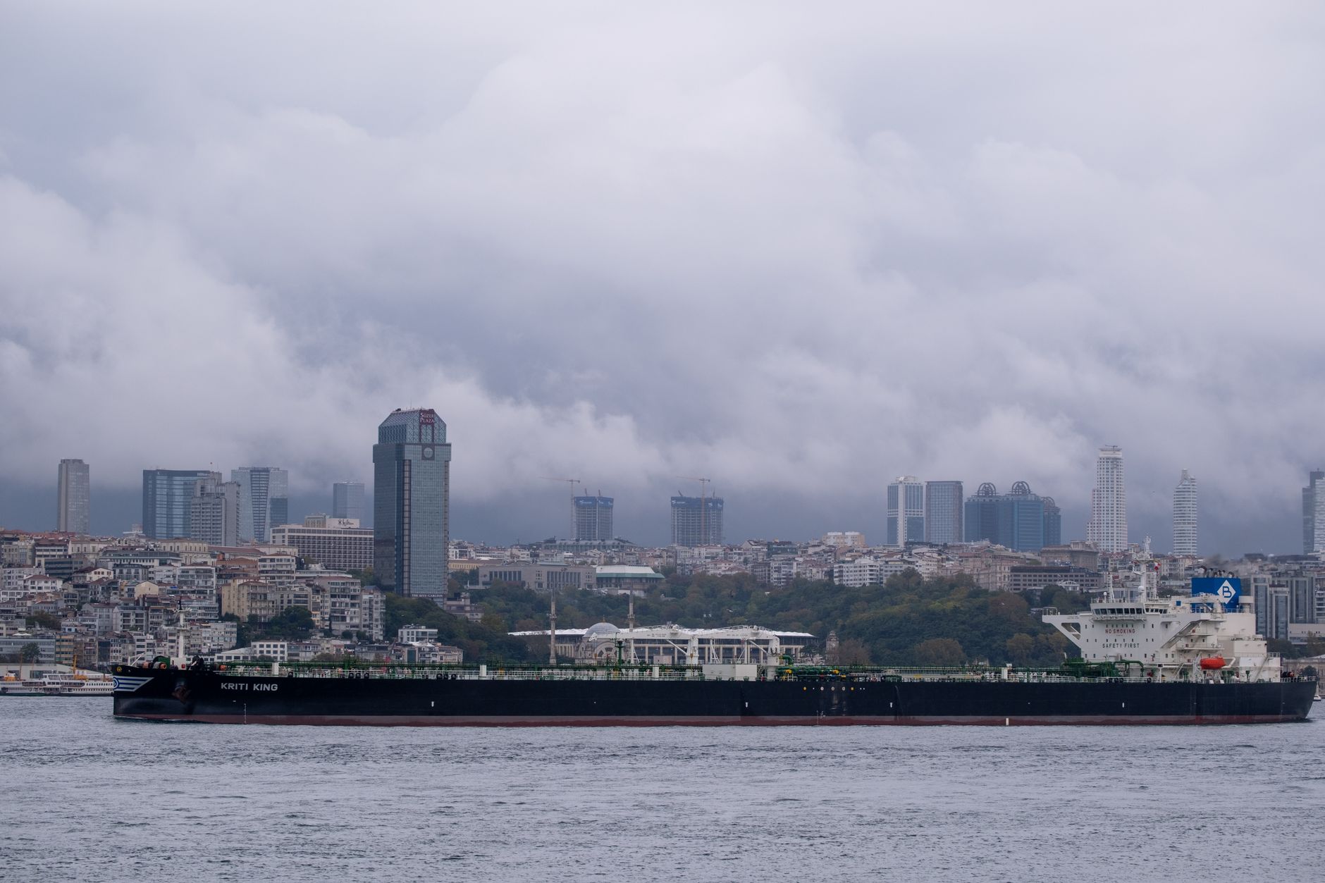 Oil tanker navigating the Bosphorus Strait with the Istanbul cityscape in the