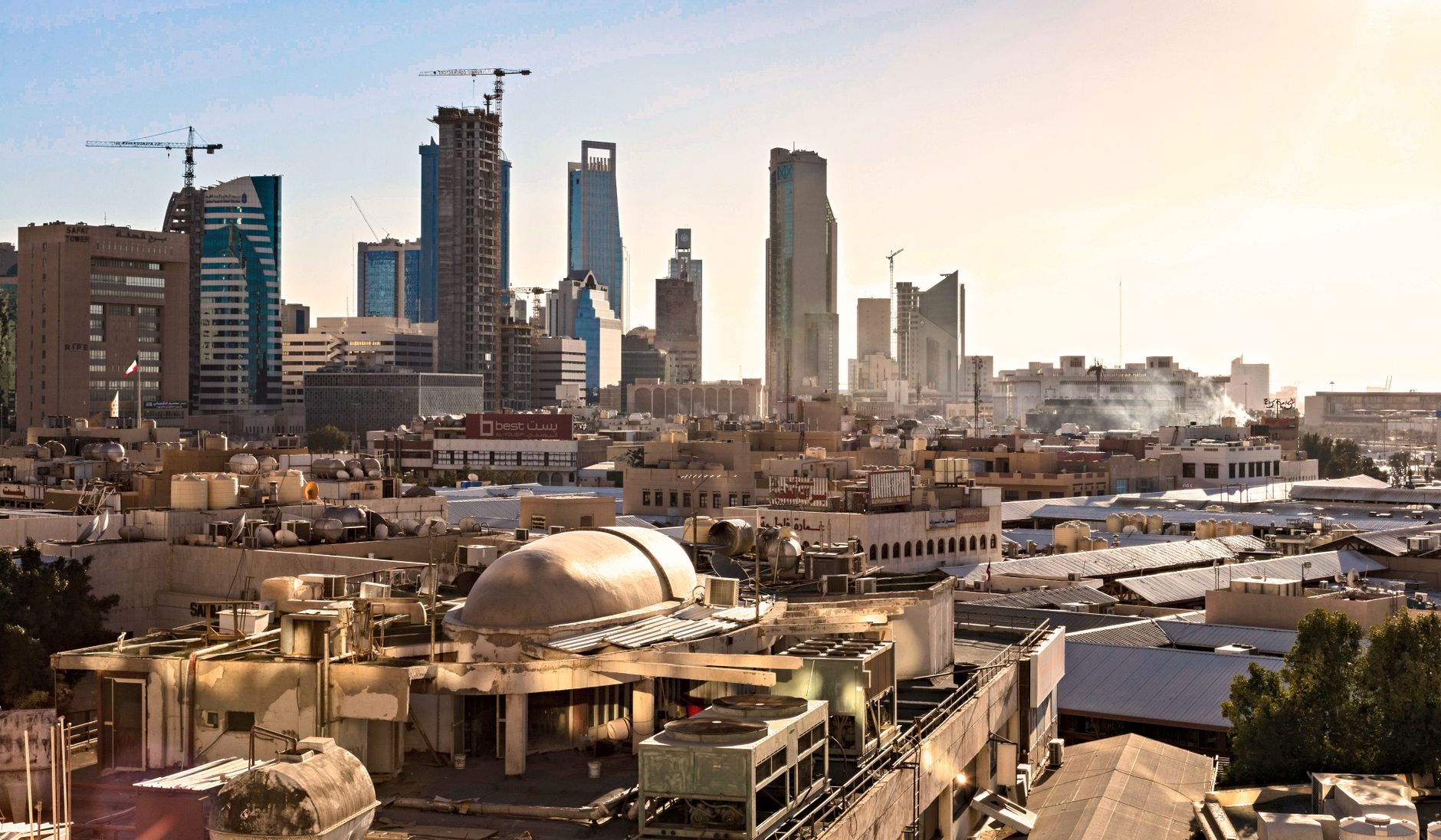 Skyline of Riyadh, Saudi Arabia featuring modern skyscrapers and construction cranes at