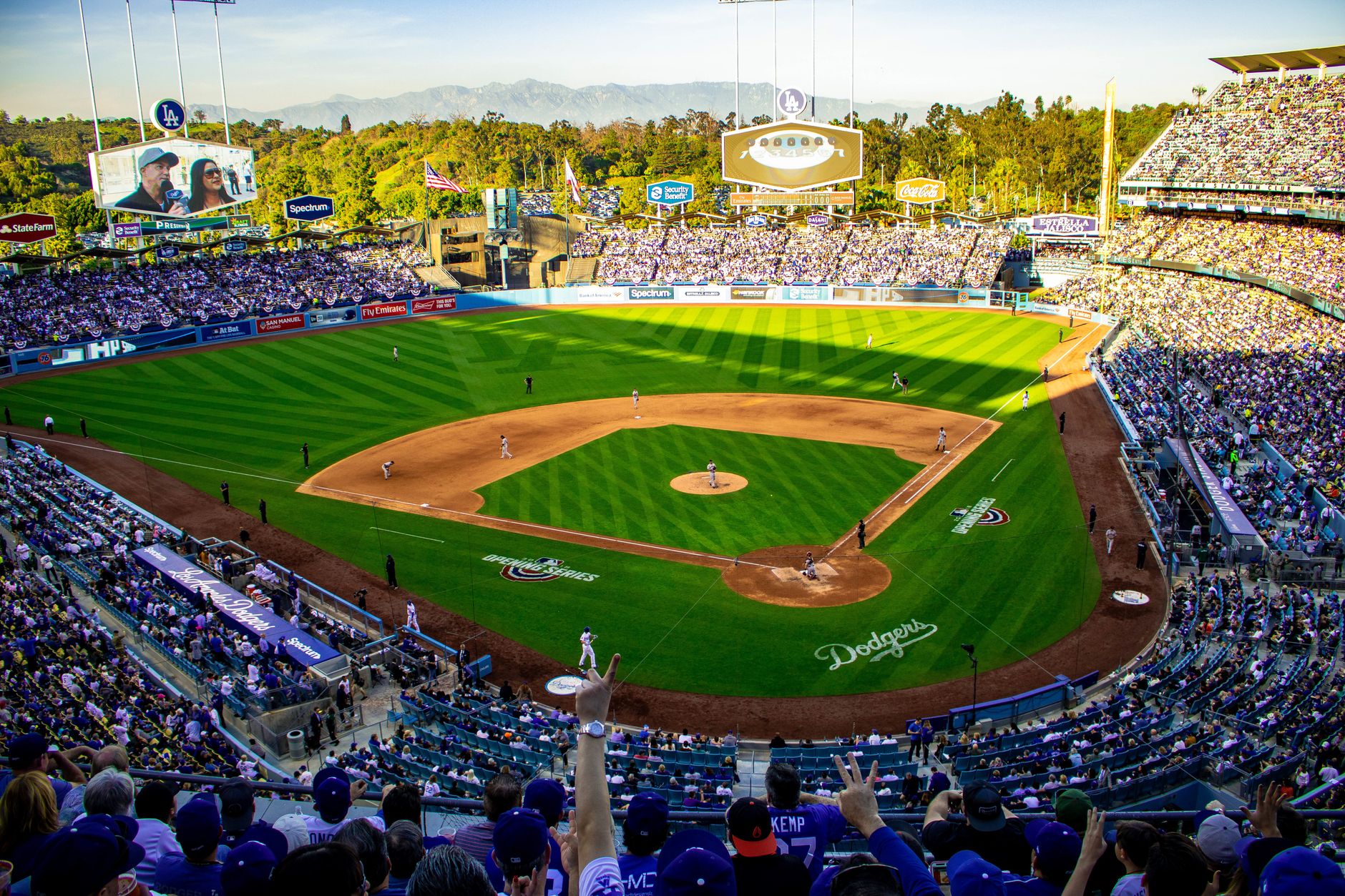 A lively baseball game at Los Angeles' iconic Dodger Stadium, capturing the